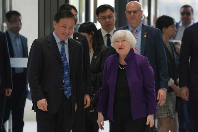 U.S. Treasury Secretary Janet Yellen, center right, talks with Governor of the People&#39;s Bank of China Pan Gongsheng as they meet at the People&#39;s Bank of China in Beijing Monday, April 8, 2024. (AP Photo/Tatan Syuflana, Pool)