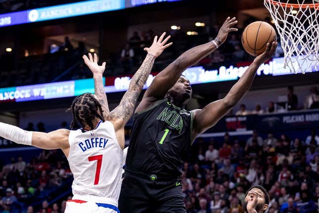Mar 15, 2024; New Orleans, Louisiana, USA;  New Orleans Pelicans forward Zion Williamson (1) drives to the basket against LA Clippers guard Amir Coffey (7) during the first half at Smoothie King Center.
