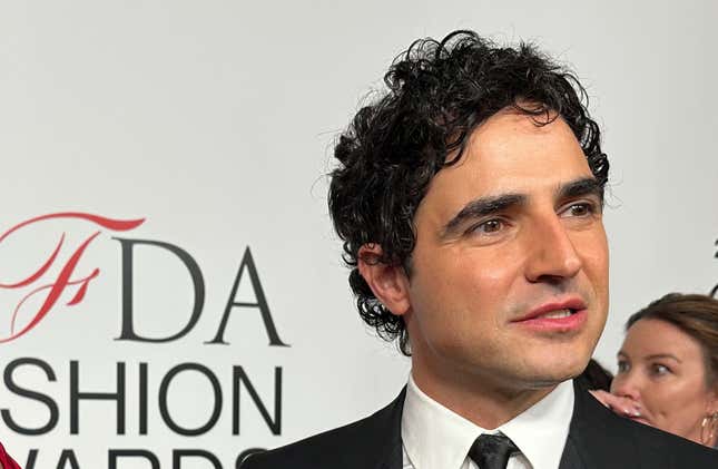 FILE - Fashion designer Zac Posen speaks with the media on the red carpet arrival at the Council of Fashion Designers of America awards, Monday, Nov. 6, 2023, in New York. In news announced Monday, Feb. 5, 2024, Gap has tapped Posen as the chain&#39;s creative director. (AP Photo/Ted Shaffrey, File)