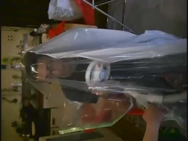 Here's A Guy Sealed In A Vacuum Bag Playing Mario Kart