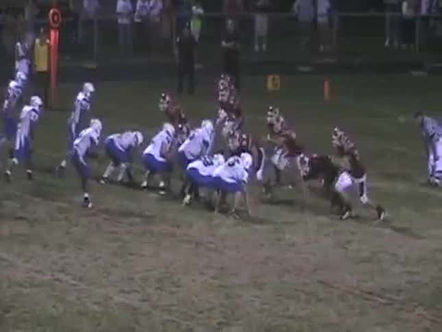 Watch This High School Quarterback Hurdle A Standing Defender (Update)
