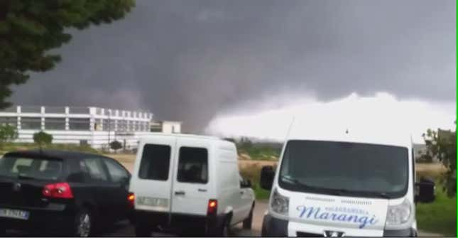 Watch These Italians Almost Get Killed By a Gigantic Tornado