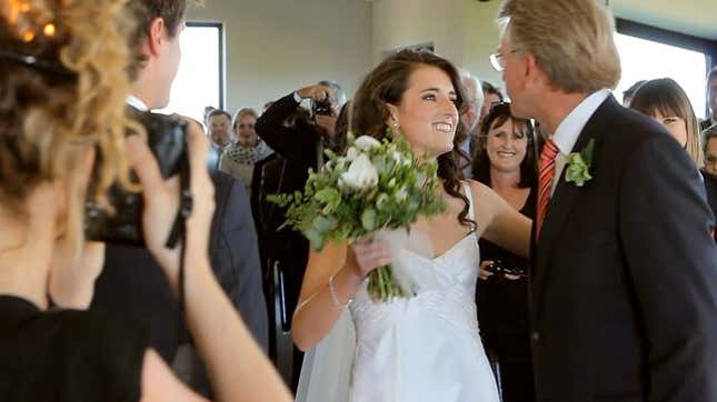 Watch This Wedding Photographer's Hair Catch on Fire (Because Apparently It's Fun)