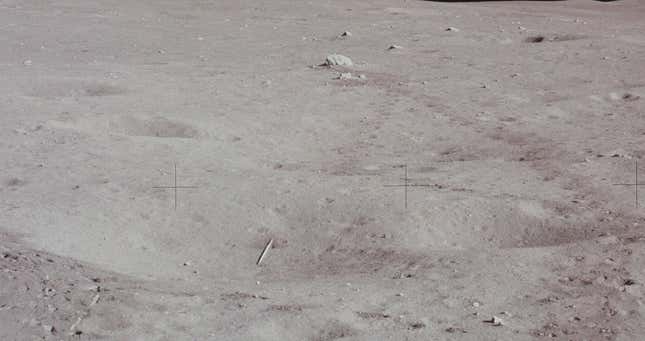 One of two golf balls left on the lunar surface can be seen just below the discarded javelin. 