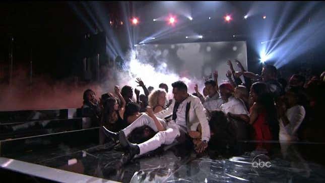 Miguel Delivered A Diving Leg Drop To Two Fans At The Billboard Awards