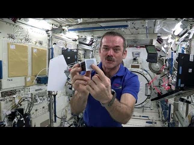 Astronaut Chris Hadfield Demonstrates How To Play Darts In Space