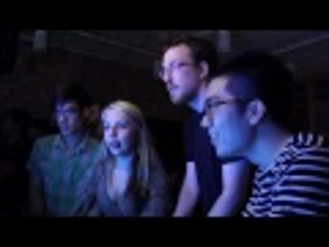 Watch a Room Full of People Cheer on a Giant Video Game Snail