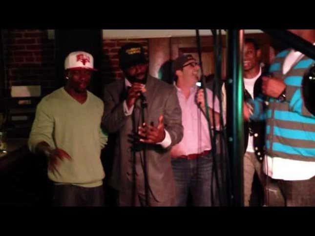 Here's A Video Of Ed Reed And Bryant McKinnie Singing "Silent Night" At A Bar To Accompany Your Christmas Celebration