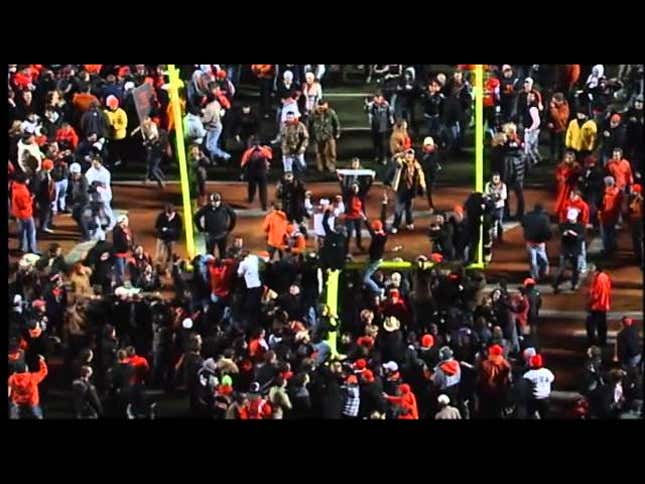 Oklahoma State Fans Storm Field Following Big 12 Championship Win, Two In Critical Condition