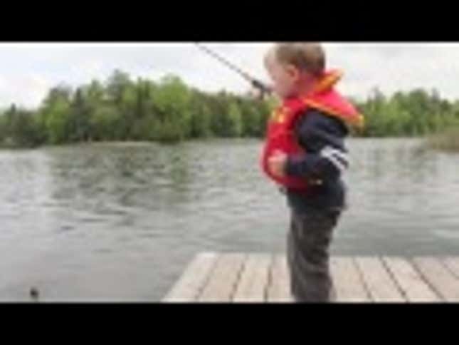 Adorable Boy Catches First Fish
