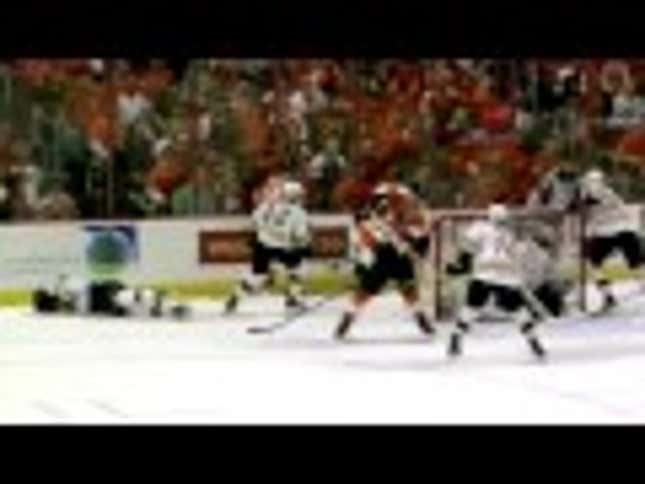 Here's A Boston Bruin Doing A Swan Dive Into The Boards