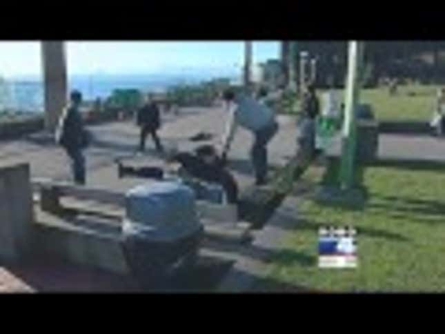Reporter With Giant Balls Breaks Up Street Fight