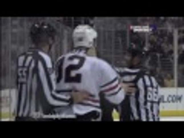 Hockey Player's Face Gets Bloodied While Lady With A Pink BlackBerry Cover Sort Of Watches