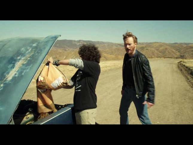 Watch Conan O'Brien Drive A Car Filled With High-Grade Explosives Off A Cliff