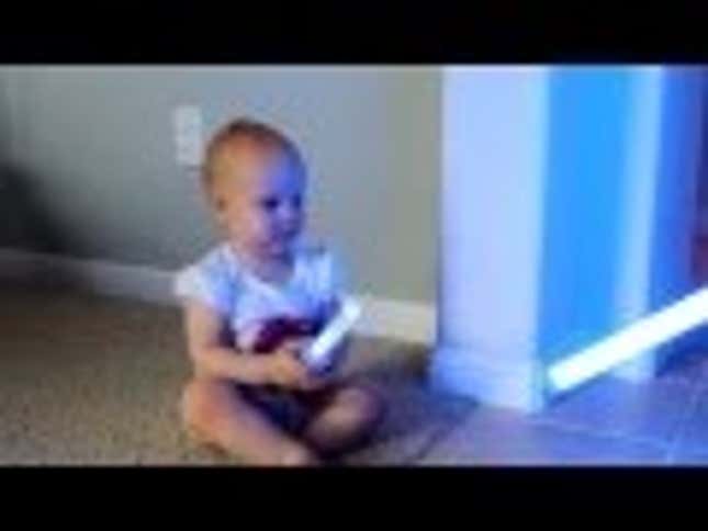 Parents Teach Baby About Space Violence with Toy Lightsaber Duel