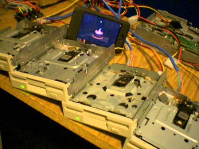 Four Floppy Drives Serenade You With "Still Alive"