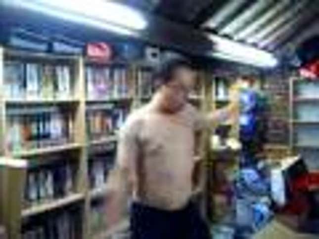 NSFW: Topless Weirdo Shows Off His Neo-Geo Collection