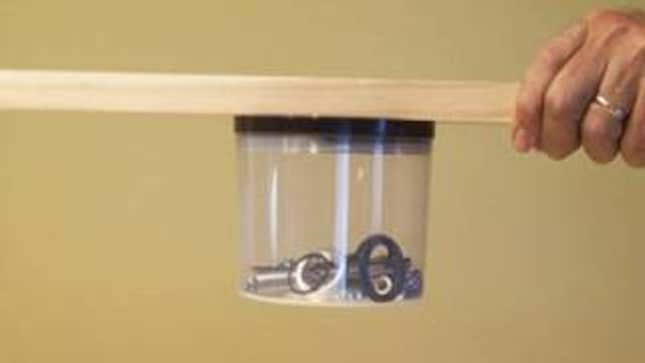 Use an Old CD Spindle as a DIY Parts Container