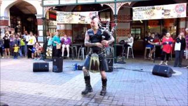 Dragonborn Street Musician Plays AC/DC On Flaming Bagpipes