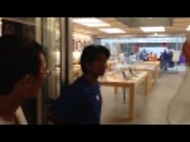 Apple Customers Escape Japanese Typhoon in Apple Store