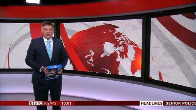 BBC Presenter Introduces News Report Holding A Pack Of Printer Paper