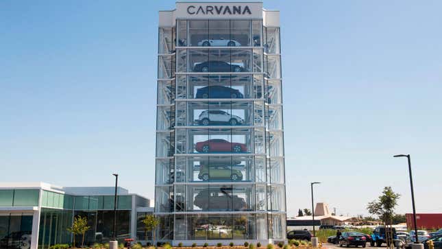 A photo of the Carvana glass tower full of cars. 