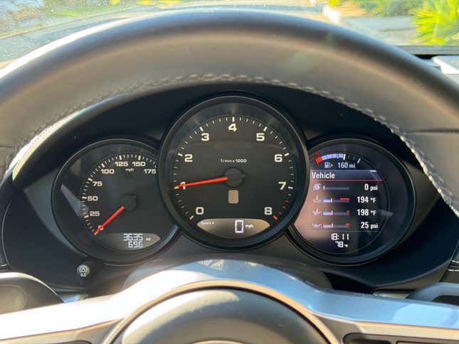 Gauge cluster of a pink Porsche 718 Boxster Style Edition