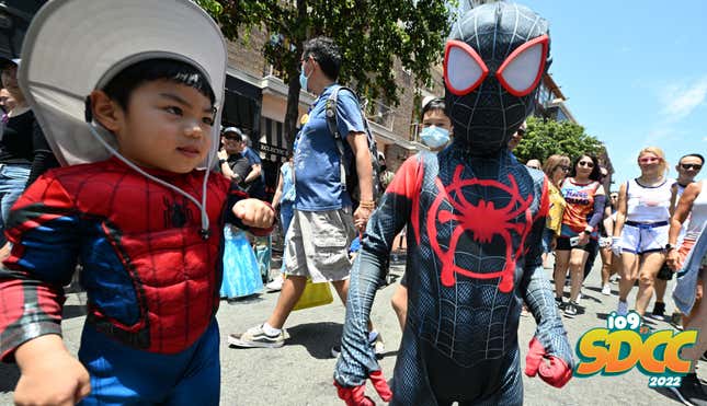 Kids cosplaying as Spider-Man (with a cowboy hat) and Miles Morales at San Diego Comic-Con 2022. 