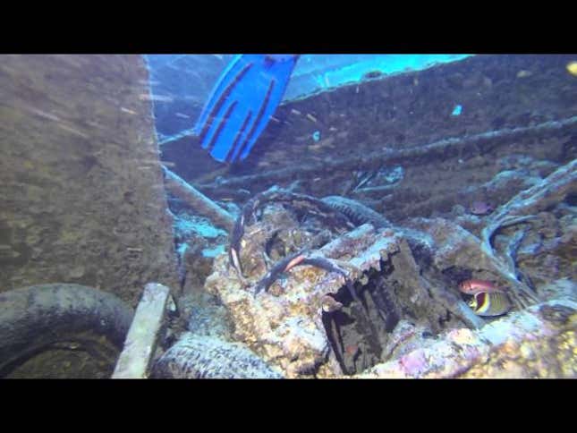Explore The Holds Of A Sunken WWII Cargo Ship Full Of Trucks