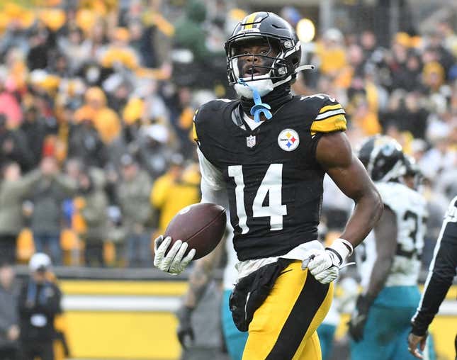 Oct 29, 2023; Pittsburgh, Pennsylvania, USA;  Pittsburgh Steelers wide receiver George Pickens (14) celebrates a third quarter touchdown against the Jacksonville Jaguars at Acrisure Stadium. The Jaguars won 20-10.