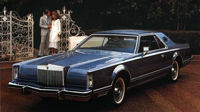 A photo of a blue Lincoln Continental coupe. 