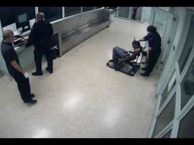 Cops Caught On Camera Restraining Black Woman And Cutting Off Her Hair