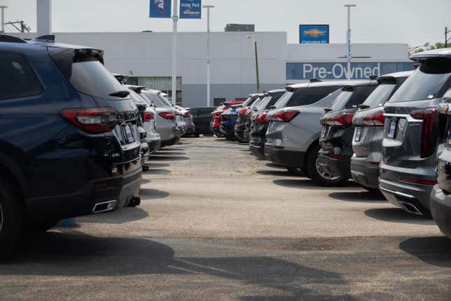 Cars sit on a Chevrolet dealership’s lot on June 20, 2024 in Chicago.