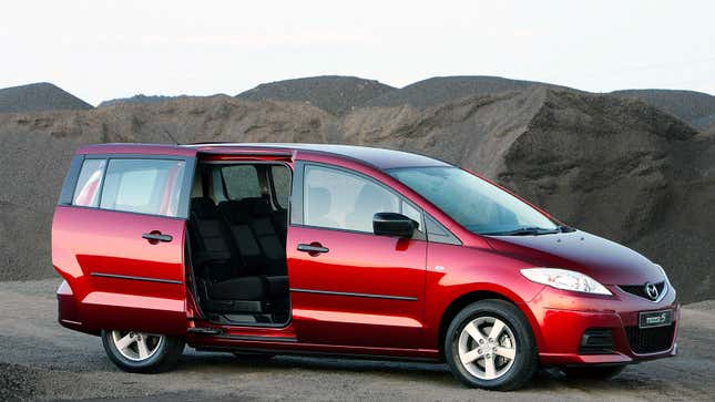 A photo of a red Mazda5 minivan with its sliding doors open. 