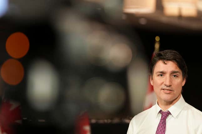 Canadian Prime Minister Justin Trudeau speaks to the media during the federal Cabinet retreat, Tuesday, Jan. 23, 2024, in Montreal. During the Cabinet retreat, Trudeau said Canada&#39;s government is preparing for the possibility that Donald Trump could reach the White House again and the “uncertainty” that would bring. (Christinne Muschi/The Canadian Press via AP)