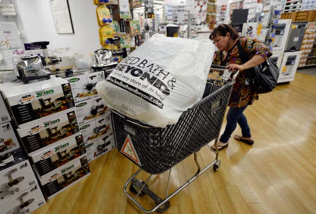 Woman shopping at a Bed Bath & Beyond