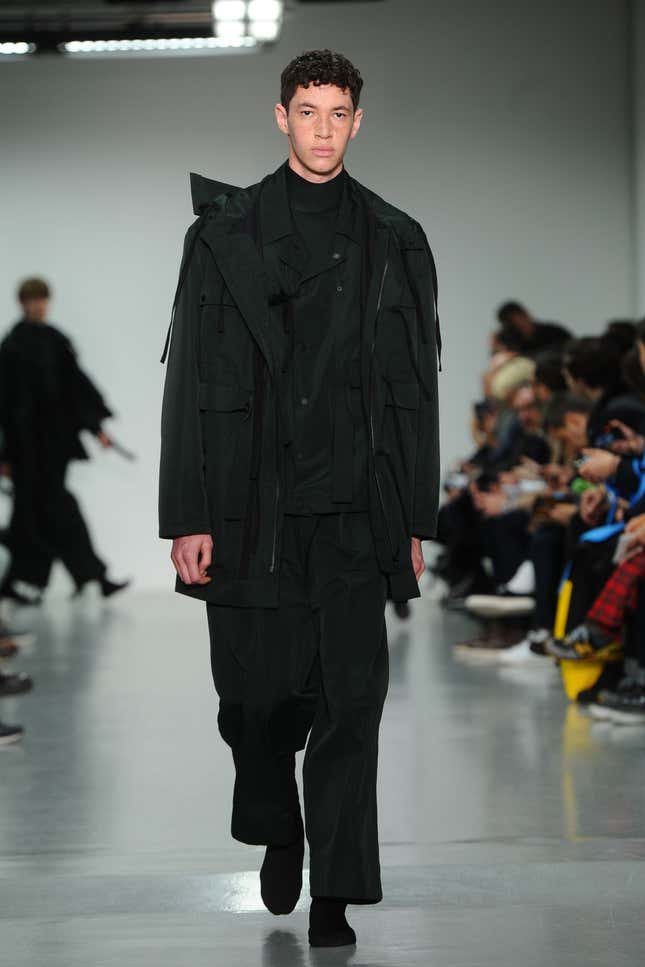 LONDON, ENGLAND - JANUARY 12: A model walks the runway during the Craig Green show at the London Collections: Men AW15 at Victoria House on January 12, 2015 in London, England. (Photo by Stuart C. Wilson/Getty Images)