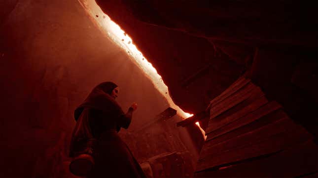 Nun standing inside of red hued crevice, INDIKA