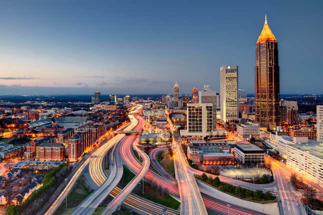 Asus Atlanta, Georgia’s midtown skyline and interstate highway system.