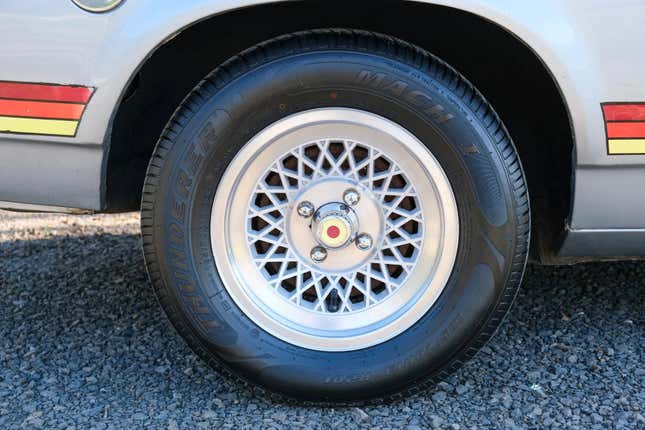 A close-up of the Astre's tiny 13" wheels
