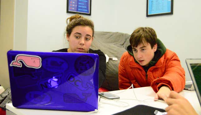 Emma Ladouceur goes over her coding project with Flatiron teaching assistant Joe Cutler, 16.