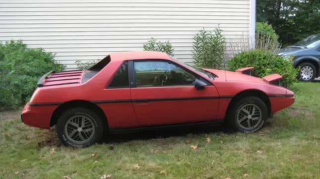 A red 1984 Pontiac Fiero