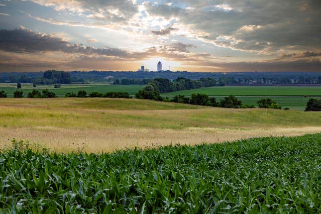 Des Moines, Iowa seen across a farm field