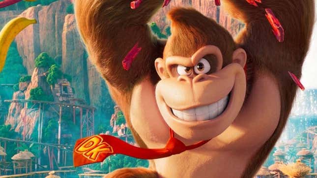 Donkey Kong smiles at the camera as he swings from a vine.