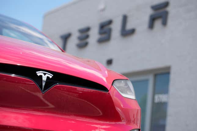 FILE - A Model X sports-utility vehicle sits outside a Tesla store in Littleton, Colo., on June 18, 2023. On Friday, April 19, 2024, Tesla knocked $2,000 off the prices of three of its five models in the United States. (AP Photo/David Zalubowski, File)