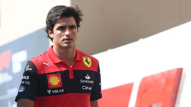 A photo of Carlos Sainz wearing his Ferrari team kit. 