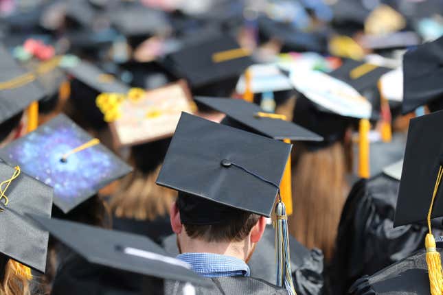 FILE - In this May 5, 2018, file photo, graduates at the University of Toledo commencement ceremony in Toledo, Ohio. On the bumpy road to repayment this fall, student loan borrowers have some qualms. Borrowers filed more than 101,000 student loan complaints with the Federal Student Aid office in 2022 – more than double from 2021 – and that number is poised to increase further as October payments approach. (AP Photo/Carlos Osorio, File)