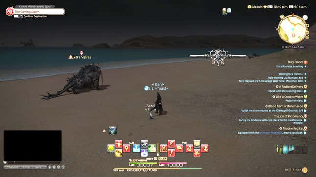 A player character in Final Fantasy 14 stands on a beach at night next to a monster.