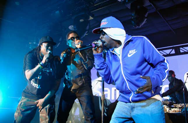 Jarobi White, left; Q-Tip, Phife Dawg and Ali Shaheed Muhammad of A Tribe Called Quest perform as Samsung Galaxy Sound Stage presents A Tribe Called Quest and Prince at SXSW on March 16, 2013 in Austin, Texas.