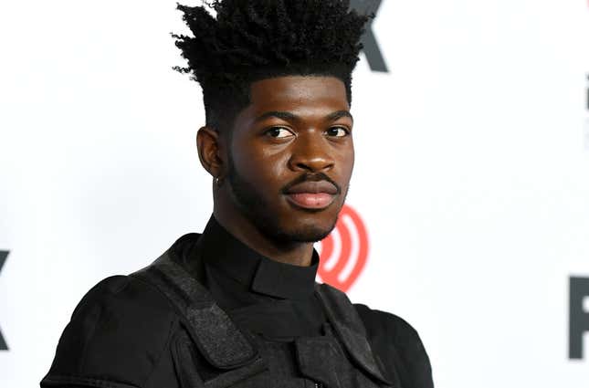 Image for article titled Lil Nas X Puts BET Award in the Toilet on ‘Late to Da Party’ Cover Art